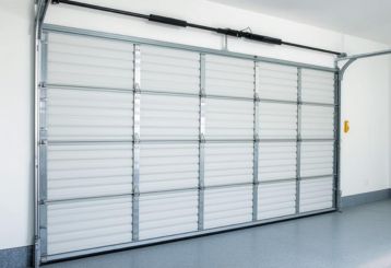 Closed garage door with clean interior showing safe and well-maintained system in Clermont, FL